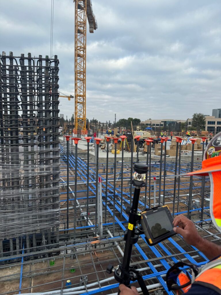digital layout on construction site with robotic total station